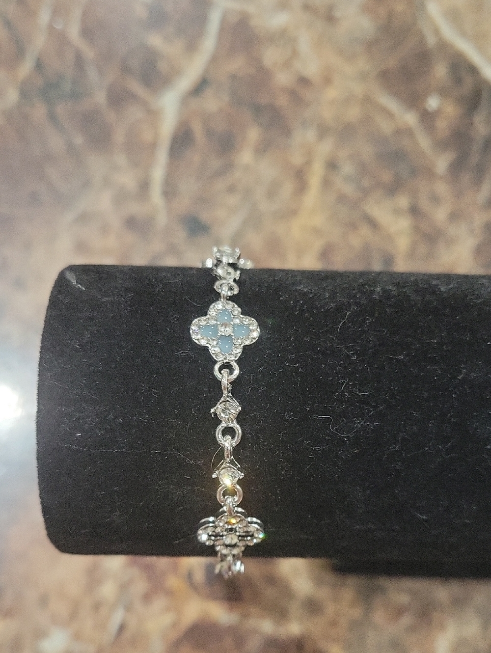Silver Bracelet with Light Blue Clover Accents